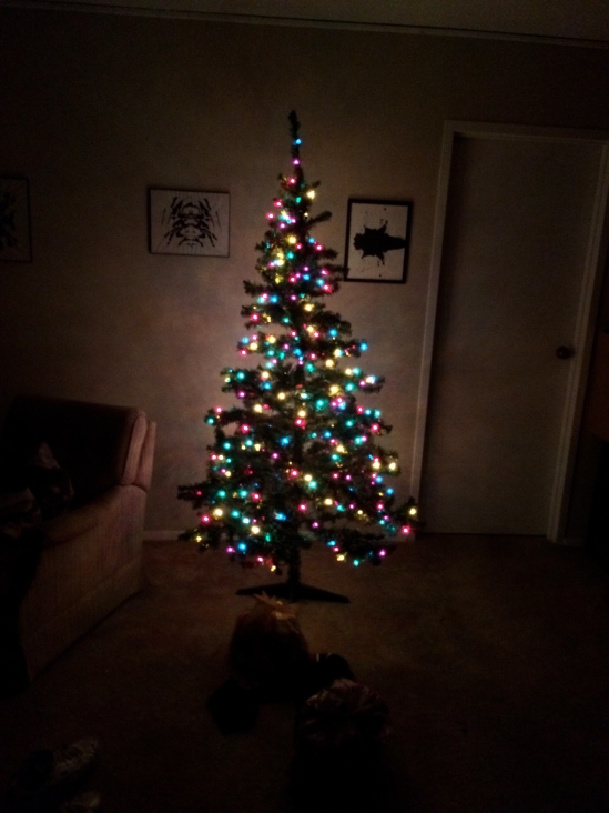 Not quite a Charlie Brown tree, but Mak Daddy loves it and that's good enough for me.